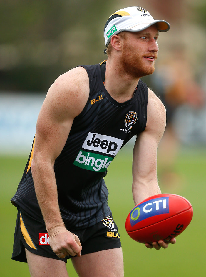AFL 2015 Training - Richmond 131115 MELBOURNE, AUSTRALIA - NOVEMBER 13: Nick Vlastuin of the Tigers warms up during the Richmond Tigers training session at the ME Bank Centre, Melbourne on November 13, 2015. (Photo: Adam Trafford/AFL Media)